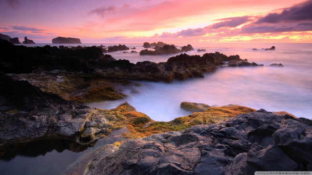 Rocky beach sunset water clouds free wallpaper for desktop - medium preview image