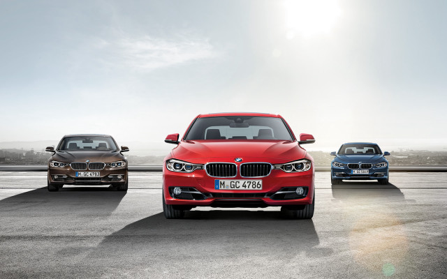 Three colored cars parking lot #3 free wallpaper for desktop - medium preview image