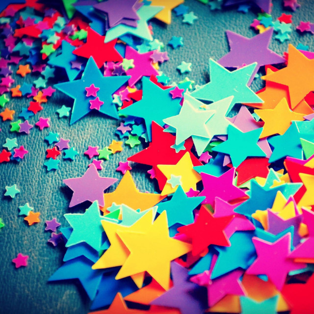 Colorful stars pile tabletop black free wallpaper for tablet - medium preview image