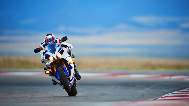 Motorcycle race track sky grass free wallpaper for desktop - medium preview image