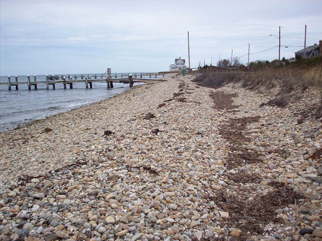 Beach pier rocks people walking free wallpaper for desktop - medium preview image