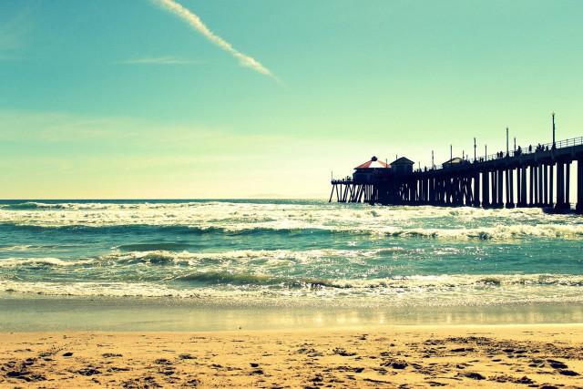 Pier person sand water beach free wallpaper for desktop - medium preview image