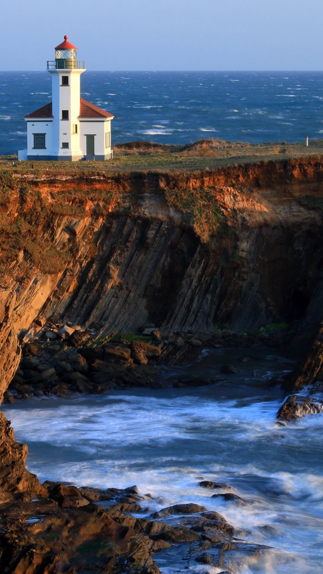 Lighthouse cliff ocean waves crashing #2 free wallpaper for mobile - medium preview image
