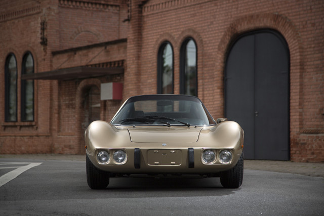 Tan sports car brick building free wallpaper for desktop - medium preview image