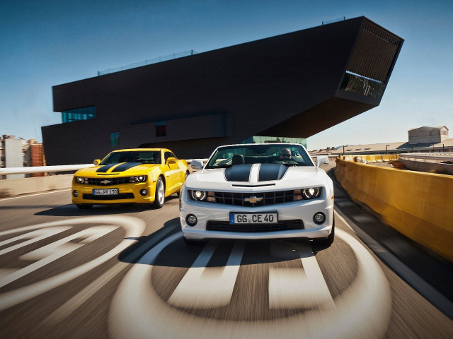 Two cars driving bridge background free wallpaper for desktop - medium preview image