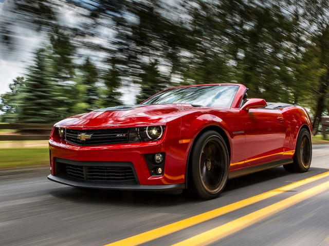 Red sports car driving road #27 free wallpaper for desktop - medium preview image