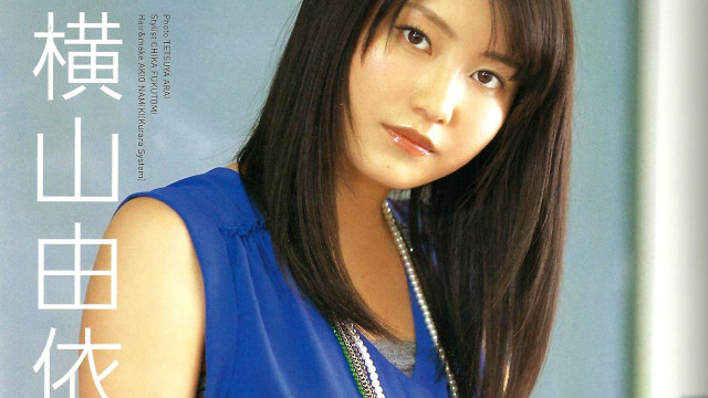 Woman blue top magazine cover free wallpaper for desktop - medium preview image