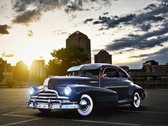 Classic car sunset parking lot free wallpaper for desktop - medium preview image