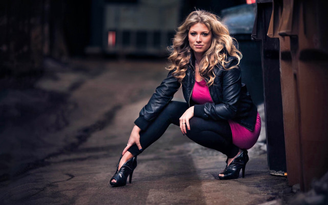 Woman pink top black pants free wallpaper for desktop - medium preview image