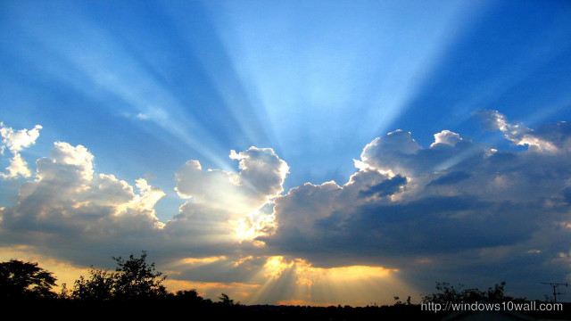 Blue sky sun rays clouds free wallpaper for desktop - medium preview image