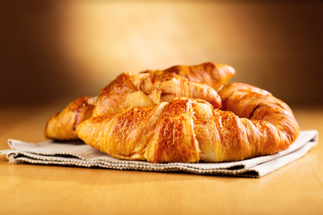 Croissants napkin tabletop blurry background free wallpaper for desktop - medium preview image