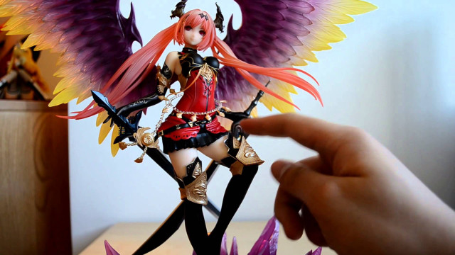 Hand holding toy doll figure free wallpaper for desktop - medium preview image