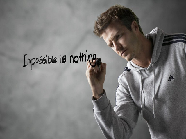 Man holding marker impossible is free wallpaper for desktop - medium preview image