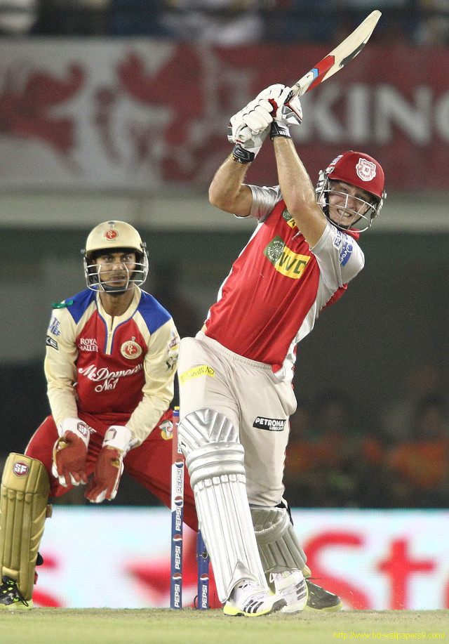 Man swinging bat ball cricket #2 free wallpaper for mobile - medium preview image