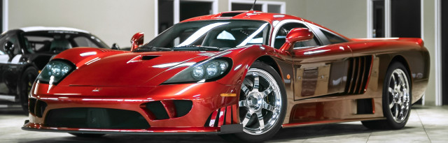 Red sports car garage open free wallpaper for desktop - medium preview image