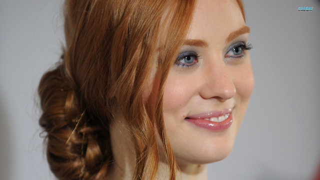 Woman braid smiling camera blue free wallpaper for desktop - medium preview image