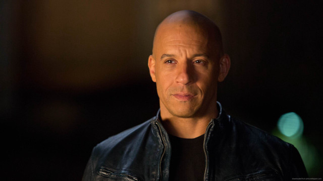 Bald man black shirt jacket free wallpaper for desktop - medium preview image