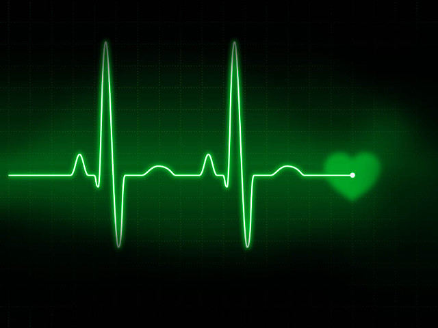 Heartbeat green glow black background free wallpaper for desktop - medium preview image