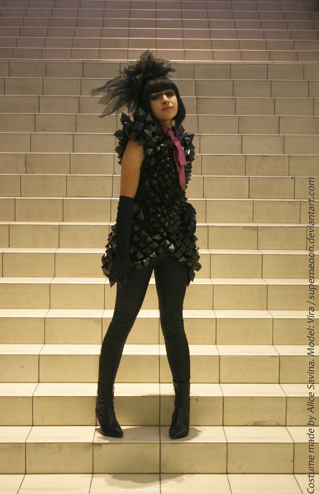 Woman standing stairs costume feathers free wallpaper for mobile - medium preview image