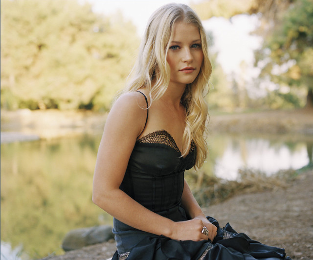 Woman sitting rock water black free wallpaper for desktop - medium preview image