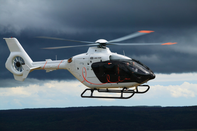 Helicopter flying cloudy sky red free wallpaper for desktop - medium preview image