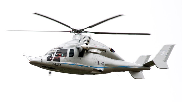 Helicopter flying sky person cockpit free wallpaper for desktop - medium preview image