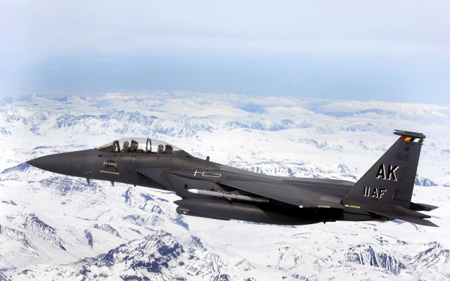 Fighter jet mountain range sky free wallpaper for desktop - medium preview image