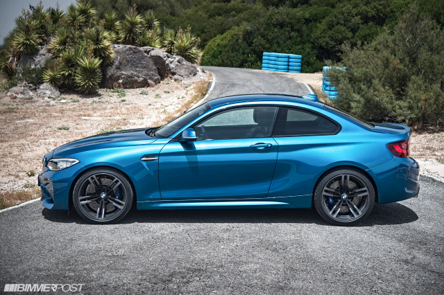 Blue bmw car parked road free wallpaper for desktop - medium preview image
