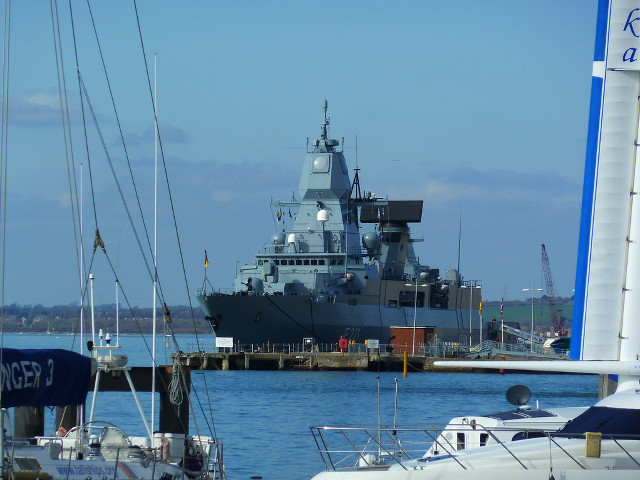 Large ship docked at dock free wallpaper for desktop - medium preview image