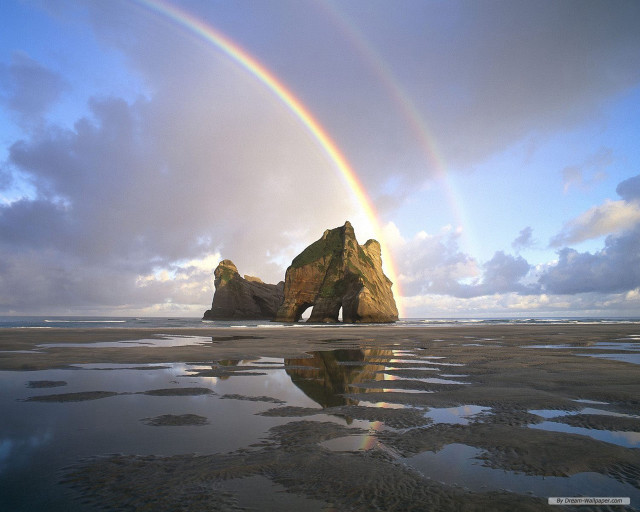 Rainbow rock formation beach reflection free wallpaper for desktop - medium preview image