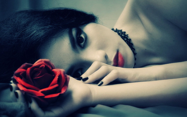 Woman laying bed rose hand free wallpaper for desktop - medium preview image