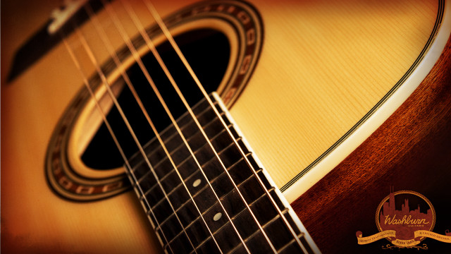 Guitar logo closeup brown background free wallpaper for desktop - medium preview image