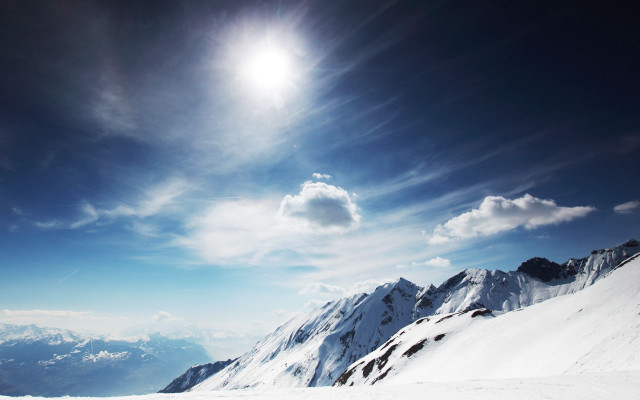 Skiing snowy mountain slope sunny free wallpaper for desktop - medium preview image