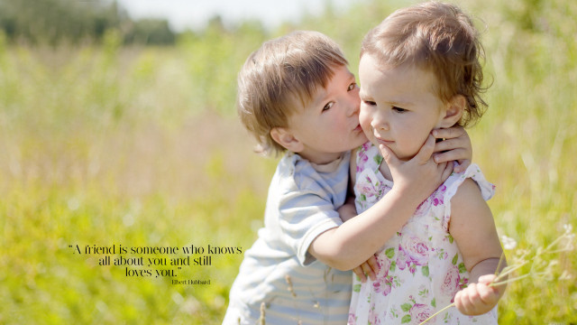 Little girls kissing field grass free wallpaper for desktop - medium preview image