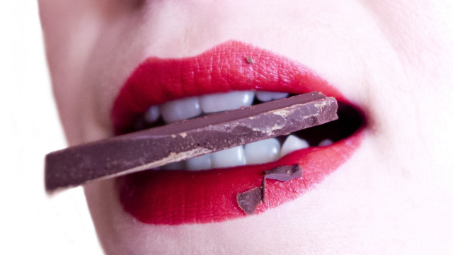 Woman chocolate bar mouth piece free wallpaper for desktop - medium preview image