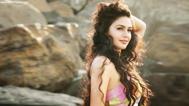 Woman long hair rocks wind free wallpaper for desktop - medium preview image