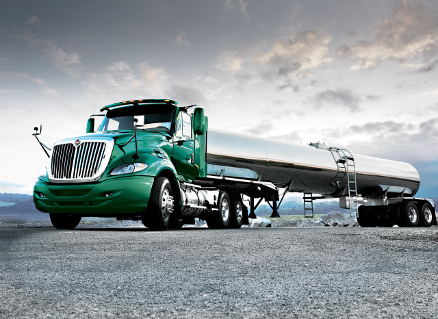 Green semi truck tanker gravel free wallpaper for desktop - medium preview image