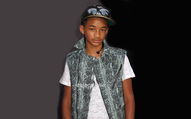 Young man green vest hat free wallpaper for desktop - medium preview image