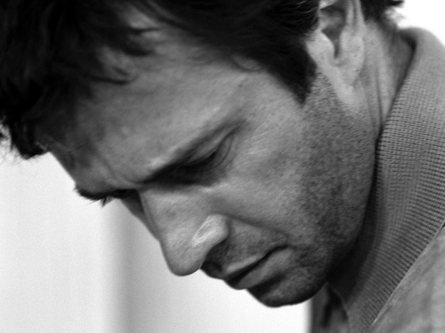 Man cellphone sweater tie blurry free wallpaper for desktop - medium preview image