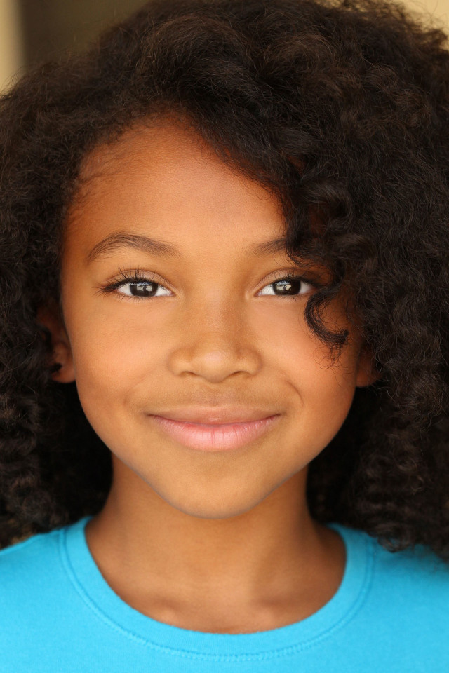 Young girl blue shirt brown free wallpaper for mobile - medium preview image