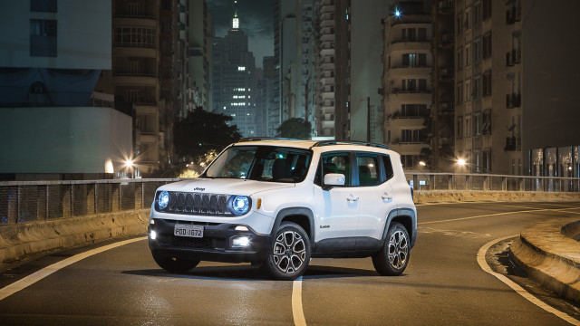 White jeep night street buildings free wallpaper for desktop - medium preview image