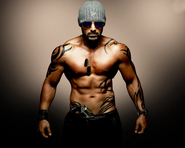 Man hat tattoos gun chest free wallpaper for desktop - medium preview image