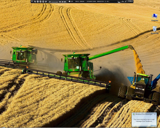 Green tractors wheat field man free wallpaper for desktop - medium preview image
