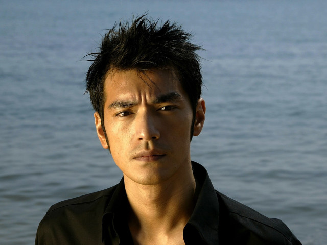 Man black shirt water beach free wallpaper for desktop - medium preview image