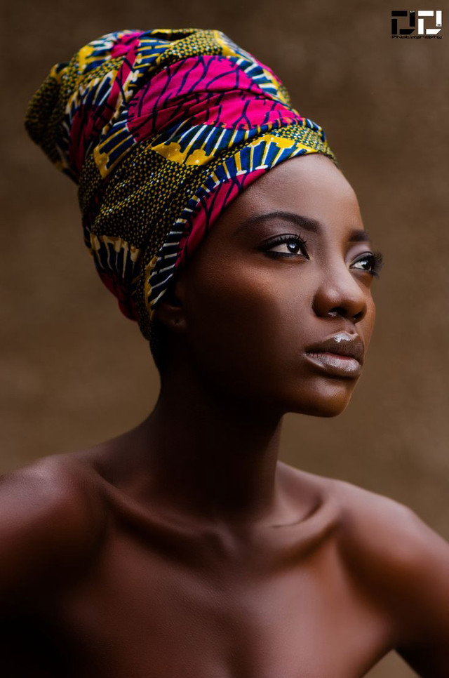 Woman head wrap brown background free wallpaper for mobile - medium preview image
