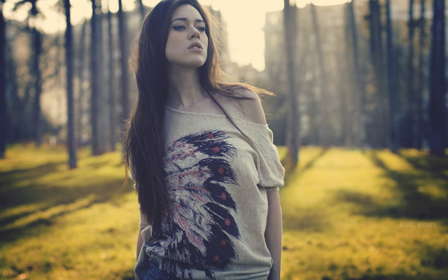 Woman forest hair wind serious free wallpaper for desktop - medium preview image