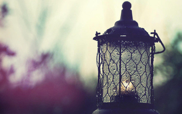 Lantern lit dark outside house free wallpaper for desktop - medium preview image