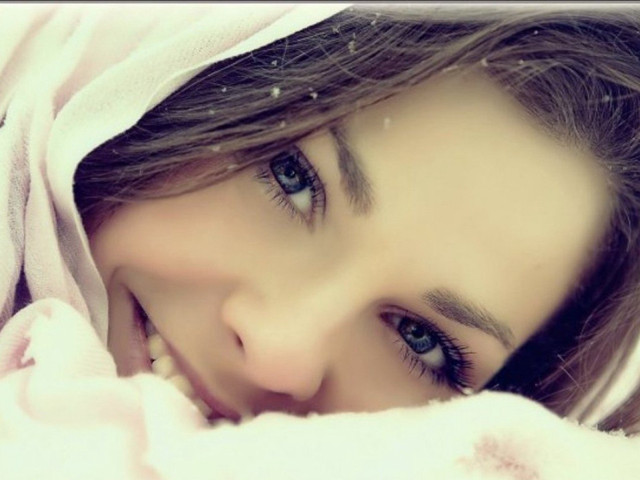 Woman blanket smiling camera happy free wallpaper for desktop - medium preview image