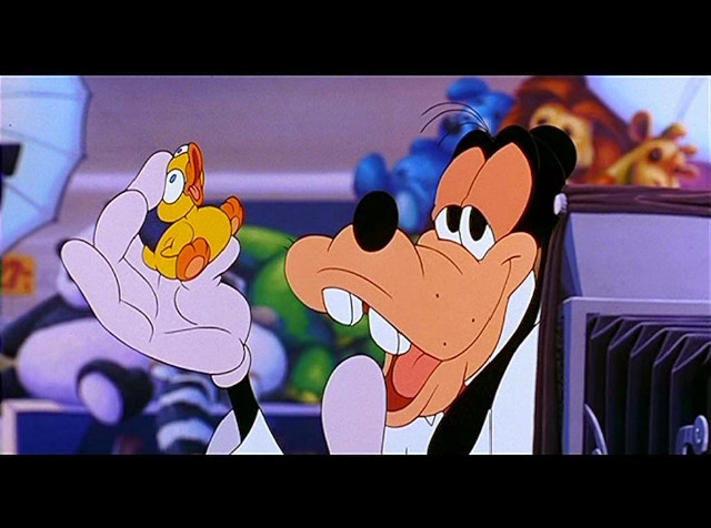 Cartoon character holding small toy free wallpaper for desktop - medium preview image