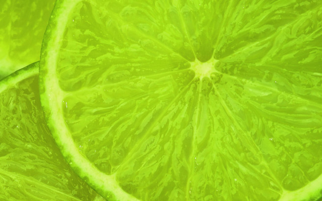 Lime slice water droplets green free wallpaper for desktop - medium preview image